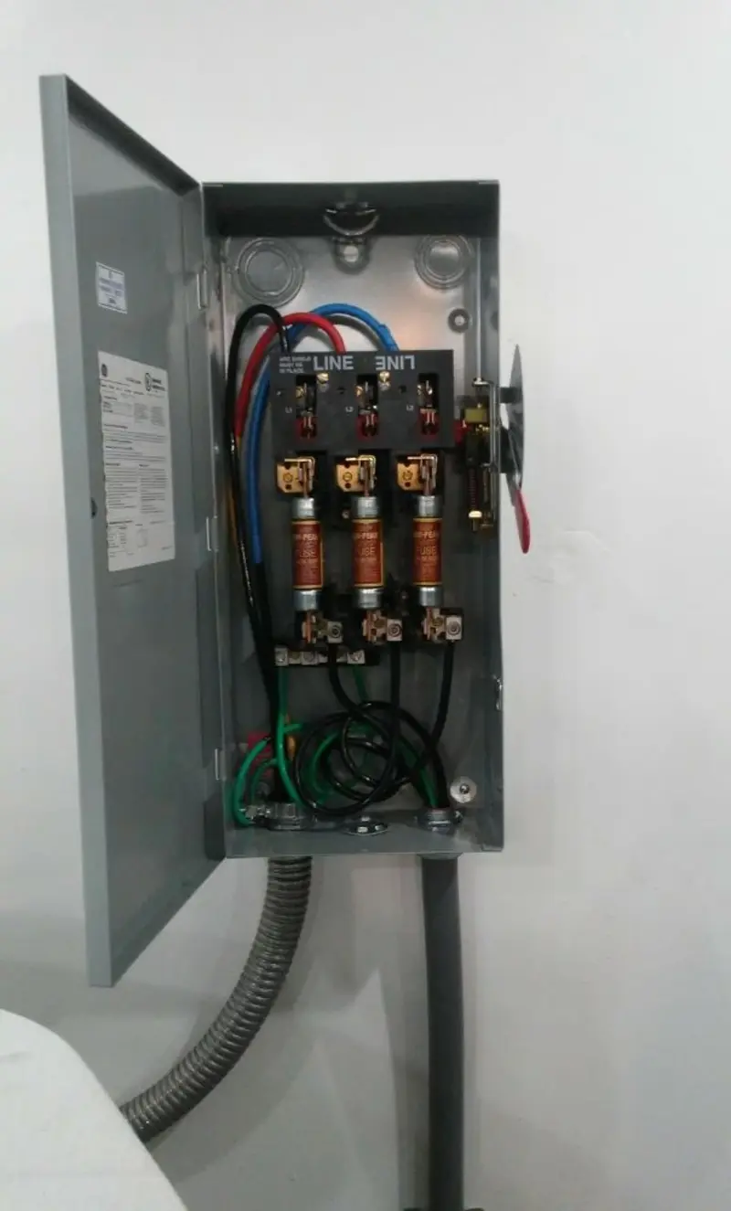 Three-phase disconnect switch installed for Smoke Detector Installation in Bethel